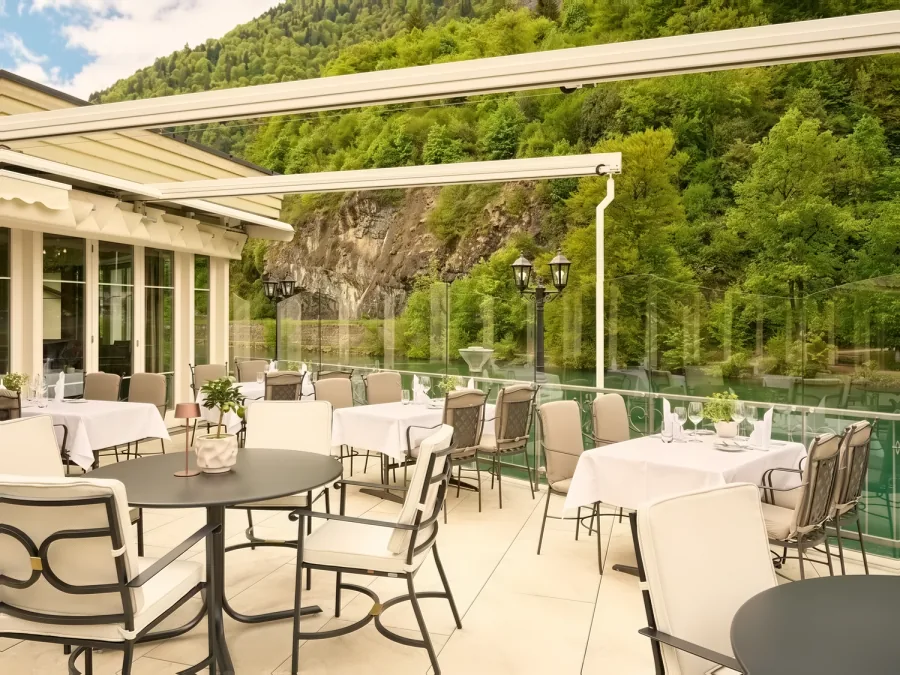 The terrace «La Belle Rivière» with parasols and mountain views
