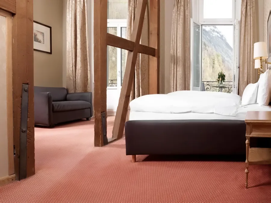 Doppelzimmer First Class unter dem Dach mit Holzbalken
